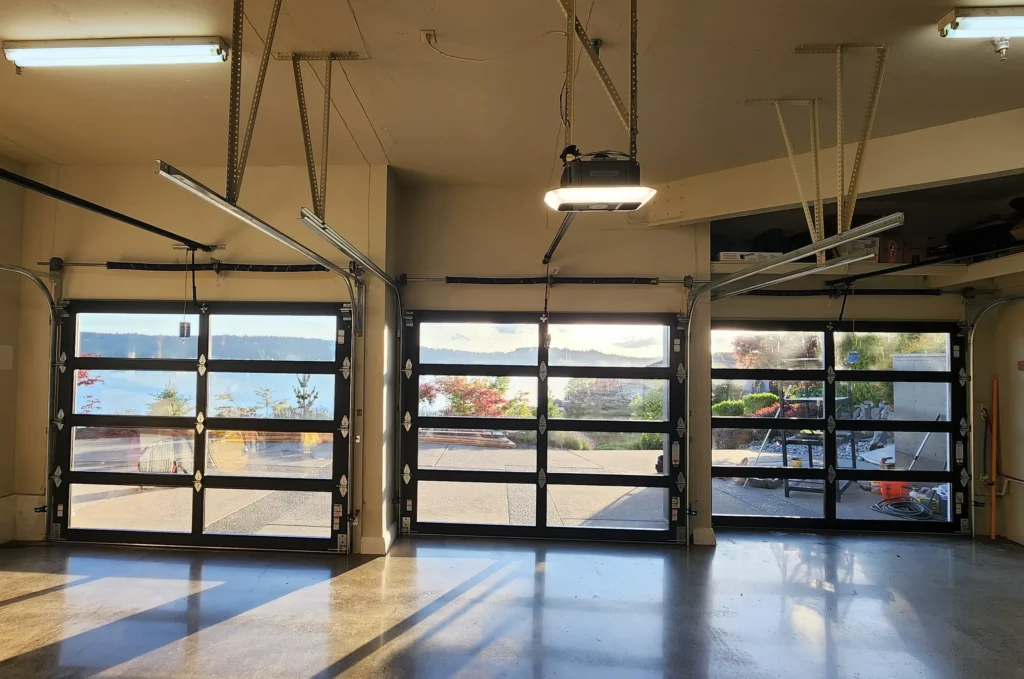 Garage with large glass doors open