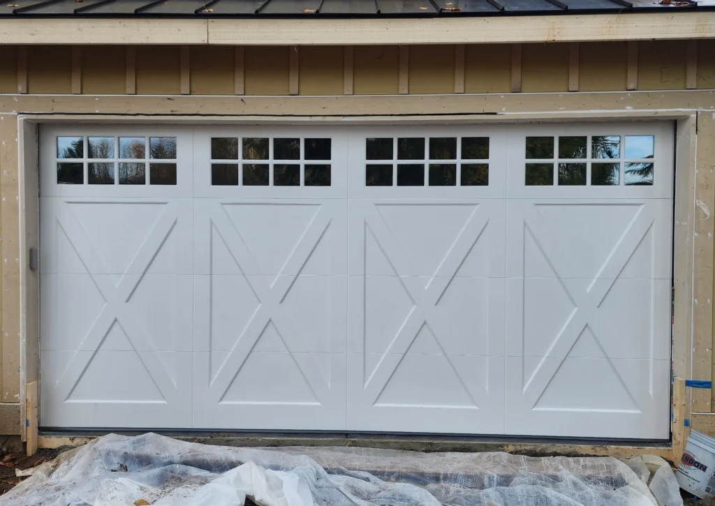 White garage door with decorative windows.